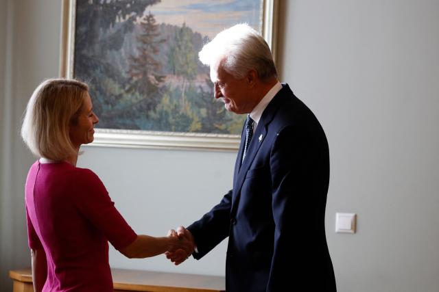 European Commission Vice-President Kaja Kallas (L) and Lithuania's President Gitanas Nauseda shake hands during her visit in Vilnius, Lithuania, on September 7, 2026. (Photo by Petras Malukas / AFP)