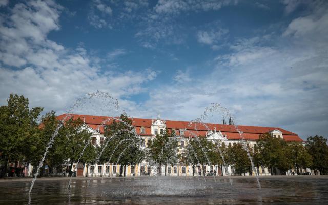 A general view taken on September 7, 2026 in Magdeburg, eastern Germany, shows a fountain at the Cathedral Square and Saxony-Anhalt's State Parliament (background), the day after the state election. German Chancellor Merz said on September 7 he was "deeply shocked" by his party's state election defeat at the hands of the far-right AfD but vowed to stay the course with tough reforms while seeking to explain them better. (Photo by Ronny HARTMANN / AFP)