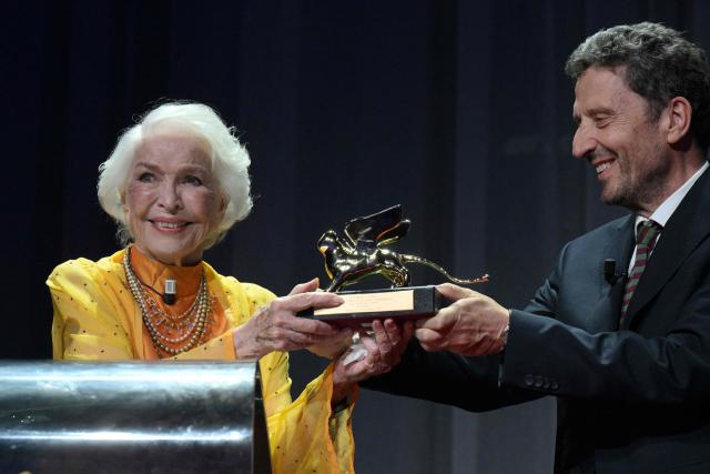 US actress Ellen Burstyn receives the Golden Lion for Lifetime Achievement from the hands of the President of Venice Film Festival, Pietrangelo Buttafuocco, during the 83rd International Venice Film Festival, on September 7, 2026 at Venice Lido. (Photo by Tiziana FABI / AFP)