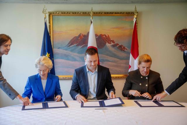 (R-L) Denmark's Prime Minister Mette Frederiksen, Greenland's government leader Jens-Frederik Nielsen and EU Commission President Ursula von der Leyen sign a joint declaration in Nuuk, Greenland, on September 7, 2026. (Photo by Mads Claus Rasmussen / Ritzau Scanpix / AFP) / Denmark OUT