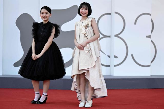 Furi Nanase and Rokka Okada attend the red carpet event of "Look Back" presented in competition at the 83rd International Venice Film Festival, at Venice Lido on September 7, 2026. (Photo by Tiziana FABI / AFP)