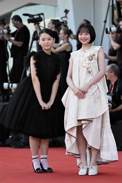 Furi Nanase and Rokka Okada attend the red carpet event of "Look Back" presented in competition at the 83rd International Venice Film Festival, at Venice Lido on September 7, 2026. (Photo by Tiziana FABI / AFP)