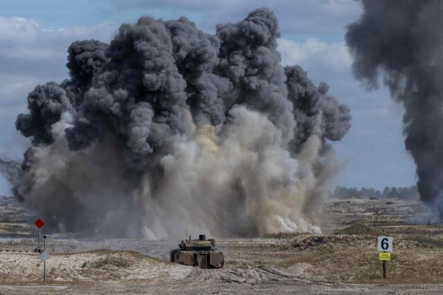 A Polish Army's US-made M1 Abrams tank drives in front of a cloud of smoke during a demonstration of Polish Army training at the military training ground in Nowa Deba, Poland on September 7, 2026, on the eve of the 34th International Defence Industry Exhibition. The 34th International Defence Industry Exhibition runs from September 8 to 11, 2026 in Kielce, Poland. (Photo by Wojtek RADWANSKI / AFP)