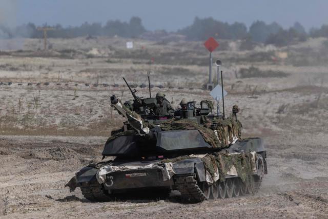 A Polish Army's US-made M1 Abrams tank drives during a demonstration of Polish Army training at the military training ground in Nowa Deba, Poland on September 7, 2026, on the eve of the 34th International Defence Industry Exhibition. The 34th International Defence Industry Exhibition runs from September 8 to 11, 2026 in Kielce, Poland. (Photo by Wojtek RADWANSKI / AFP)