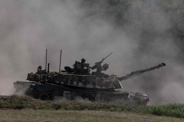 A Polish Army's US-made M1 Abrams tank drives during a demonstration of Polish Army training at the military training ground in Nowa Deba, Poland on September 7, 2026, on the eve of the 34th International Defence Industry Exhibition. The 34th International Defence Industry Exhibition runs from September 8 to 11, 2026 in Kielce, Poland. (Photo by Wojtek RADWANSKI / AFP)