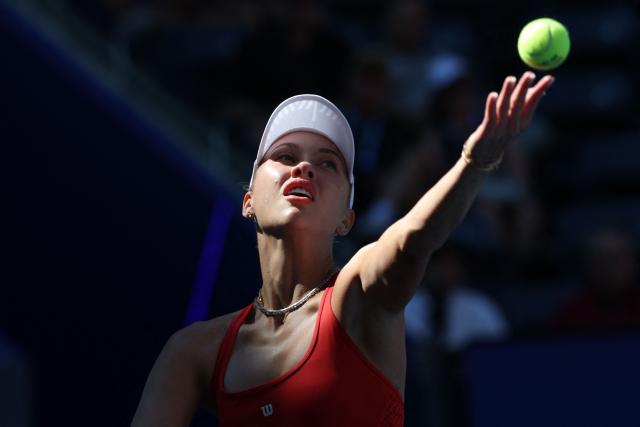 Austria's Anastasia Potapova serves to Russia's Mirra Andreeva during their women's singles round of 16 tennis match on day nine of the US Open tennis tournament at the USTA Billie Jean King National Tennis Center in New York City on September 7, 2026. (Photo by TIMOTHY A. CLARY / AFP)