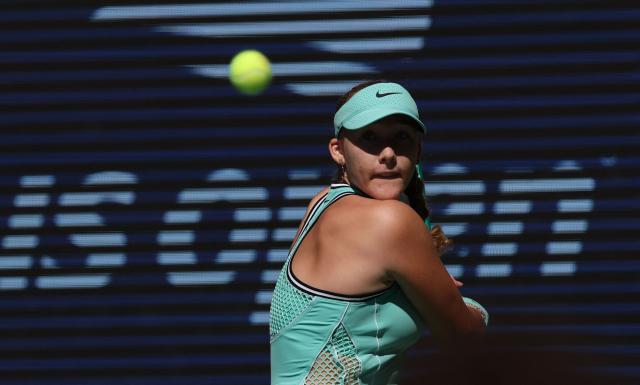 Russia's Mirra Andreeva hits a return against Austria's Anastasia Potapova during their women's singles round of 16 tennis match on day nine of the US Open tennis tournament at the USTA Billie Jean King National Tennis Center in New York City on September 7, 2026. (Photo by TIMOTHY A. CLARY / AFP)