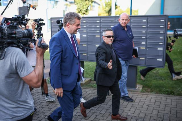 Saxony-Anhalt's State Premier Sven Schulze (C) arrives for a meeting of the conservative Christian Democratic Union (CDU) party on the aftermath of the state election in Saxony-Anhalt, on September 7, 2026 in the GTZH Industry Park in Magdeburg. German Chancellor Friedrich Merz's conservatives licked their wounds September 7, 2026 after a crushing state election defeat in the ex-communist east, as the triumphant far-right AfD launched a withering attack against him. (Photo by Ronny HARTMANN / AFP)