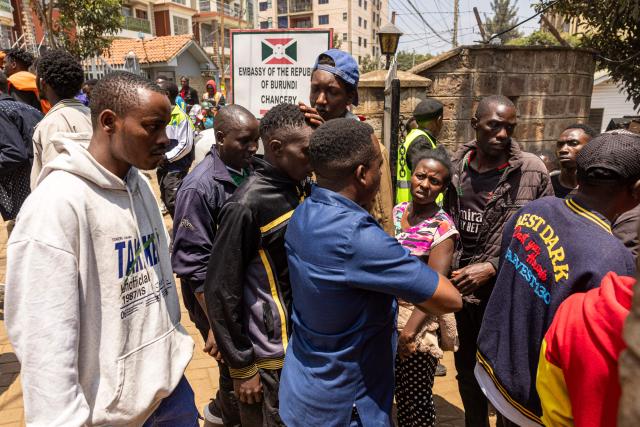 Burundian nationals gather outside their embassy to apply for border passes as they prepare to travel back to their country following the Kenyan government’s directive on undocumented small-scale traders, in Nairobi on September 7, 2026. (Photo by SIMON MAINA / AFP)