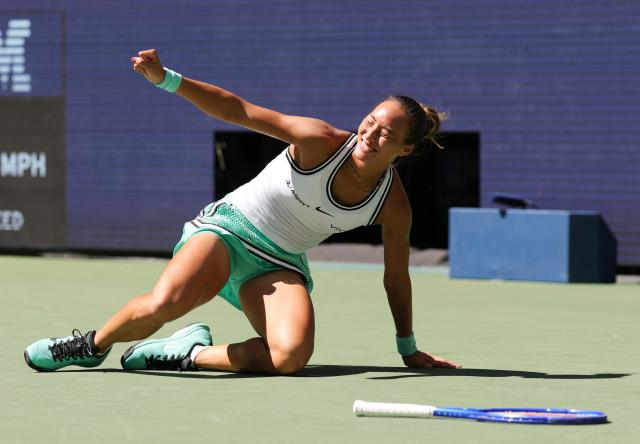 China's Qinwen Zheng celebrates defeating Poland's Iga Swiatek in their women's singles round of 16 tennis match on day nine of the US Open tennis tournament at the USTA Billie Jean King National Tennis Center in New York on September 7, 2026. (Photo by KENA BETANCUR / AFP)