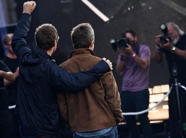 British Musicians and Oasis singers Liam Gallagher (L) Noel Gallagher poses for selected media as they arrive for the UK premiere of the film 'Oasis: Don't Look Back In Anger', in Leicester Square in central London on September 7, 2026. (Photo by Henry NICHOLLS / AFP)