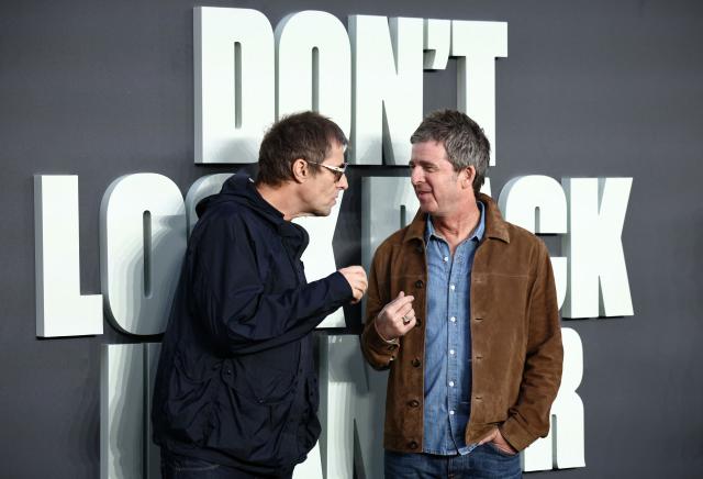 British Musicians and Oasis singers Liam Gallagher (L) Noel Gallagher pose upon arrival on the red carpet for the UK premiere of the film 'Oasis: Don't Look Back In Anger', in Leicester Square in central London on September 7, 2026. (Photo by Henry NICHOLLS / AFP)