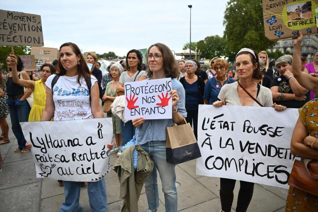 Demonstrators hold placards outside Bayonne City Hall as they protest against sexual violence on the day of the examination by a special committee of the National Assembly of a Bill for the protection of women and children, in Bayonne on September 7, 2026. Following the Lyhanna case- involving an 11-year-old middle school student found raped and murdered in June - a highly anticipated "comprehensive" bill aiming to address the entire spectrum of violence (identification, prevention, support, the justice system and the monitoring of both perpetrators and victims) began its legislative journey on September 7, 2026, being reviewed by a special committee at the National Assembly ahead of its presentation to Parliament in early October. (Photo by Gaizka IROZ / AFP)