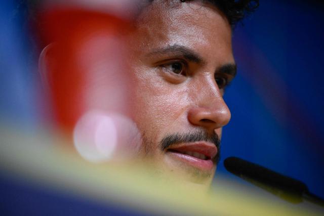 Manchester City's Portuguese midfielder #27 Matheus Nunes gives a press conference  ahead of the UEFA Champions League first round day 1 football match between FC Porto and Manchester City at the Dragao stadium on September 7, 2026. (Photo by Miguel RIOPA / AFP)