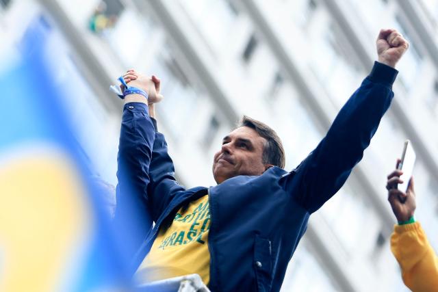 Brazil's presidential candidate Flavio Bolsonaro, of the Liberal Party (PL), gestures during a rally held on Independence Day in Sao Paulo, Brazil, on September 7, 2026. (Photo by Miguel SCHINCARIOL / AFP)