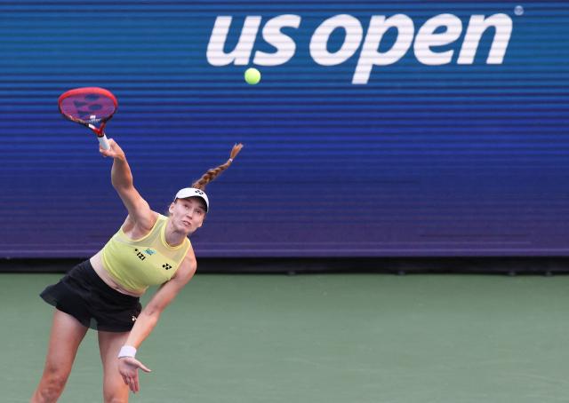 Kazakhstan's Elena Rybakina serves to Japan's Naomi Osaka during the women's singles round of 16 tennis match on day nine of the US Open tennis tournament at the USTA Billie Jean King National Tennis Center in New York City on September 7, 2026. (Photo by TIMOTHY A. CLARY / AFP)