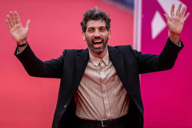 US director and director of photography Joshua Z. Weinstein reacts as he poses on the red carpet upon arrival during the 52nd edition of the Deauville American film festival, in Deauville, northwestern France on September 7, 2026. (Photo by Guillaume SALIGOT / AFP)