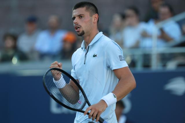 France's Arthur Gea pumps his fist as he plays Netherlands' Botic van de Zandschulp in their men's singles round of 16 tennis match on day nine of the US Open tennis tournament at the USTA Billie Jean King National Tennis Center in New York on September 7, 2026. (Photo by Leonardo MUNOZ / AFP)