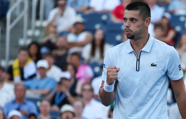 France's Arthur Gea pumps his fist as he plays Netherlands' Botic van de Zandschulp in their men's singles round of 16 tennis match on day nine of the US Open tennis tournament at the USTA Billie Jean King National Tennis Center in New York on September 7, 2026. (Photo by Leonardo MUNOZ / AFP)