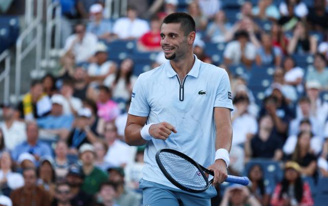 France's Arthur Gea smiles as he plays Netherlands' Botic van de Zandschulp in their men's singles round of 16 tennis match on day nine of the US Open tennis tournament at the USTA Billie Jean King National Tennis Center in New York on September 7, 2026. (Photo by Leonardo MUNOZ / AFP)