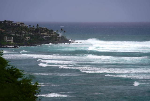 Large waves break off Diamond Head Beach Park in Honolulu, Hawaii, on September 7, 2026, as surf generated by Tropical Storm Lowell begins to build along Oahus south-facing shores. A hurricane warning was issued September 7 for the westernmost Hawaiian islands of Kauai and Niihau as Category 3 Hurricane Lowell approached the US Pacific island chain, the National Hurricane Center (NHC) said.
The core of Lowell was expected to pass just west of Niihau on the night of September 7 or early on September 8, the center said in its latest bulletin released at 8 am Hawaii time (1800GMT). (Photo by Michelle Bir / AFP)