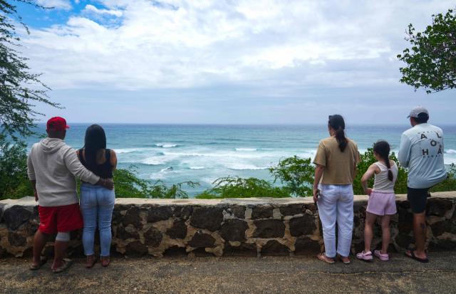 People watch waves build off Diamond Head Beach Park in Honolulu, Hawaii, on September 7, 2026, as surf generated by Tropical Storm Lowell begins to build along Oahus south-facing shores. A hurricane warning was issued September 7 for the westernmost Hawaiian islands of Kauai and Niihau as Category 3 Hurricane Lowell approached the US Pacific island chain, the National Hurricane Center (NHC) said.
The core of Lowell was expected to pass just west of Niihau on the night of September 7 or early on September 8, the center said in its latest bulletin released at 8 am Hawaii time (1800GMT). (Photo by Michelle Bir / AFP)