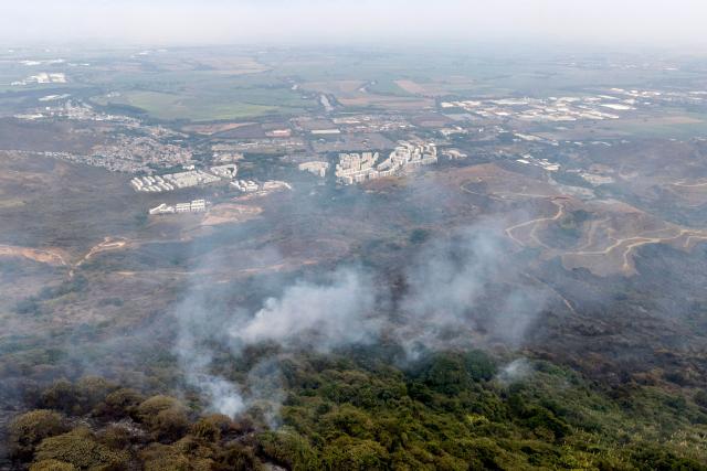 This aerial view shows a wildfire at Cerro Gordo in Yumbo, Valle del Cauca department, Colombia on September 7, 2026. (Photo by JOAQUIN SARMIENTO / AFP)