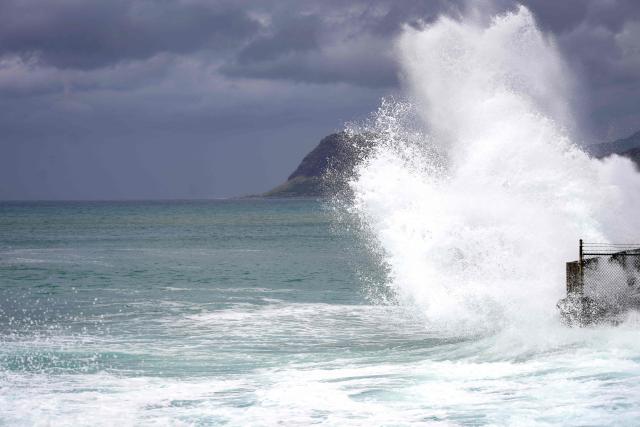 A large wave crashes along the shoreline at Electric Beach in Waianae, Hawaii, on September 7, 2026. A hurricane warning was issued September 7 for the westernmost Hawaiian islands of Kauai and Niihau as Category 3 Hurricane Lowell approached the US Pacific island chain, the National Hurricane Center (NHC) said. The core of Lowell was expected to pass just west of Niihau on the night of September 7 or early on September 8, the center said in its latest bulletin released at 8 am Hawaii time (1800GMT). (Photo by Michelle Bir / AFP)