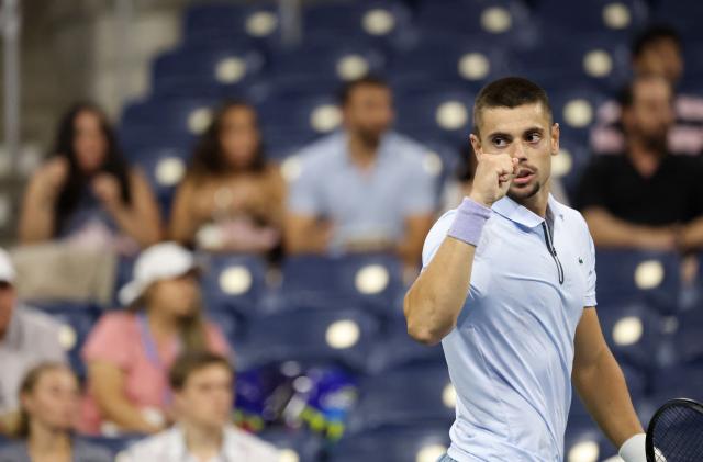 France's Arthur Gea reacts to a point as he plays Netherlands' Botic van de Zandschulp during the men's singles round of 16 tennis match on day nine of the US Open tennis tournament at the USTA Billie Jean King National Tennis Center in New York City on September 7, 2026. (Photo by Leonardo MUNOZ / AFP)
