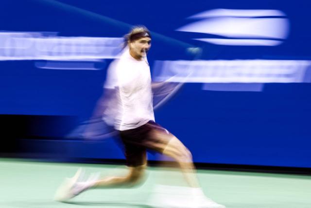 Germany's Alexander Zverev hits a return during the men's singles round of 16 tennis match against Italy's Luciano Darderi on day nine of the US Open tennis tournament at the USTA Billie Jean King National Tennis Center in New York City on September 7, 2026. (Photo by CHARLY TRIBALLEAU / AFP)