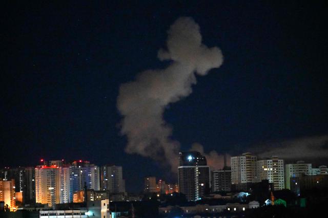 Smoke from an explosion rises following Russian missiles strike in Kyiv, Ukraine, early on September 8, 2026, amid Russian invasion in Ukraine. A wave of strong explosions rang out in Kyiv, AFP journalists said, as Russia resumed strikes on the Ukrainian capital after a three-day halt. Russian President Vladimir Putin had ordered the pause in attacks as US President Donald Trump's envoys Steve Witkoff and Jared Kushner visited the Russian and Ukrainian capitals at the weekend. (Photo by Sergei SUPINSKY / AFP)