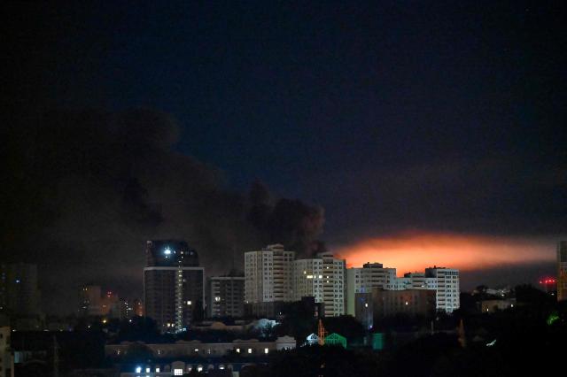 This photograph shows fire and smoke rising following Russian missiles strike in Kyiv, Ukraine, early on September 8, 2026, amid Russian invasion in Ukraine. A wave of strong explosions rang out in Kyiv, AFP journalists said, as Russia resumed strikes on the Ukrainian capital after a three-day halt. Russian President Vladimir Putin had ordered the pause in attacks as US President Donald Trump's envoys Steve Witkoff and Jared Kushner visited the Russian and Ukrainian capitals at the weekend. (Photo by Sergei SUPINSKY / AFP)