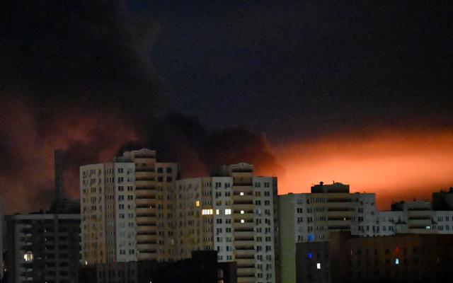 This photograph shows fire and smoke rising following Russian missiles strike in Kyiv, Ukraine, early on September 8, 2026, amid Russian invasion in Ukraine. A wave of strong explosions rang out in Kyiv, AFP journalists said, as Russia resumed strikes on the Ukrainian capital after a three-day halt. Russian President Vladimir Putin had ordered the pause in attacks as US President Donald Trump's envoys Steve Witkoff and Jared Kushner visited the Russian and Ukrainian capitals at the weekend. (Photo by Sergei SUPINSKY / AFP)