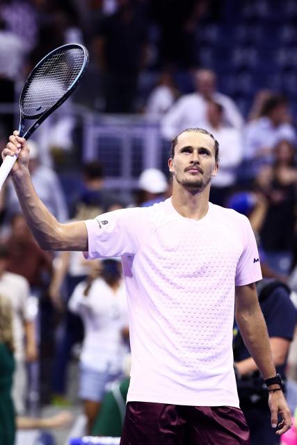 Germany's Alexander Zverev celebrates after victory during the men's singles round of 16 tennis match against Italy's Luciano Darderi on day nine of the US Open tennis tournament at the USTA Billie Jean King National Tennis Center in New York City on September 7, 2026. (Photo by CHARLY TRIBALLEAU / AFP)