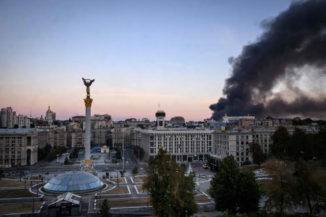 This photograph shows smoke rising over buildings following Russian air attacks, in downtown Kyiv on September 8, 2026, amid the Russian invasion of Ukraine. A series of "strong" explosions rang out in Kyiv, AFP journalists said early on September 8, as Russia resumed strikes on the Ukrainian capital after a three-day halt. (Photo by Mladen ANTONOV / AFP)