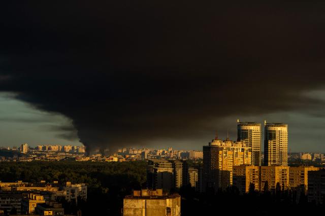 This photograph shows smoke rising following Russian missiles strike in Kyiv, Ukraine, early on September 8, 2026, amid Russian invasion in Ukraine. A wave of strong explosions rang out in Kyiv, AFP journalists said, as Russia resumed strikes on the Ukrainian capital after a three-day halt. Russian President Vladimir Putin had ordered the pause in attacks as US President Donald Trump's envoys Steve Witkoff and Jared Kushner visited the Russian and Ukrainian capitals at the weekend. (Photo by Eugene KOTENKO / AFP)