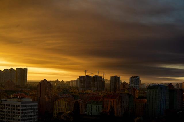 This photograph shows smoke rising following Russian missiles strike in Kyiv, Ukraine, early on September 8, 2026, amid Russian invasion in Ukraine. A wave of strong explosions rang out in Kyiv, AFP journalists said, as Russia resumed strikes on the Ukrainian capital after a three-day halt. Russian President Vladimir Putin had ordered the pause in attacks as US President Donald Trump's envoys Steve Witkoff and Jared Kushner visited the Russian and Ukrainian capitals at the weekend. (Photo by Eugene KOTENKO / AFP)