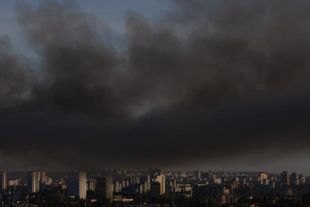 Smoke rises over the city following a Russian air attack on Kyiv on September 8, 2026, amid the Russian invasion of Ukraine. A wave of strong explosions rang out in Kyiv, AFP journalists said, as Russia resumed strikes on the Ukrainian capital after a three-day halt. Russian President Vladimir Putin had ordered the pause in attacks as US President Donald Trump's envoys Steve Witkoff and Jared Kushner visited the Russian and Ukrainian capitals at the weekend. (Photo by Roman PILIPEY / AFP)