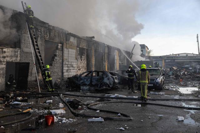 Firefighters push out a fire following Russian missiles strikes in Kyiv early on September 8, 2026, amid the Russian invasion in Ukraine. A wave of strong explosions rang out in Kyiv, AFP journalists said early on September 8, as Russia resumed strikes on the Ukrainian capital after a three-day halt. (Photo by Serhii Okunev / AFP)
