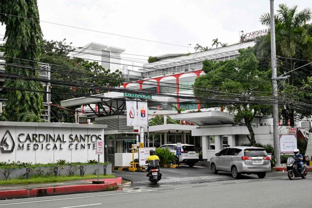 The entrance to the Cardinal Santos Medical Center is seen in San Juan, Metro Manila on September 8, 2026, following the arrest of Philippine lawmaker Martin Romualdez, a cousin of President Ferdinand Marcos Jr. Philippine police arrested a lawmaker and cousin of President Ferdinand Marcos Jr. in his hospital bed on September 8 over his alleged involvement in a massive corruption scandal tied to bogus flood control projects. (Photo by Jam STA ROSA / AFP)