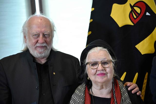 German actress Hanna Schygulla (R) poses with Hungarian writer and Literature Nobel Prize laureate László Krasznahorkai as he is awarded with the Grand Cross of Merit with Star in Berlin, on September 8, 2026. (Photo by Tobias SCHWARZ / AFP)