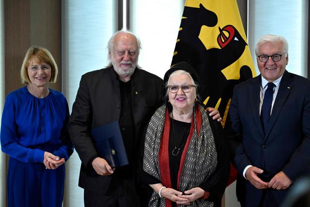 Hungarian writer and Literature Nobel Prize laureate László Krasznahorkai (2nd L) poses with German President Frank-Walter Steinmeier (R), the President's wife Elke Budenbender (L) and German actress Hanna Schygulla during the award ceremony for the Grand Cross of Merit with Star in Berlin, on September 8, 2026. (Photo by Tobias SCHWARZ / AFP)