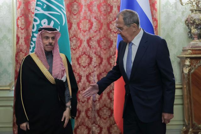 Russia's Foreign Minister Sergey Lavrov (R) welcomes Saudi Arabia's Foreign Minister Faisal bin Farhan Al Saud during their meeting in Moscow on September 8, 2026. (Photo by MAXIM SHIPENKOV / POOL / AFP)