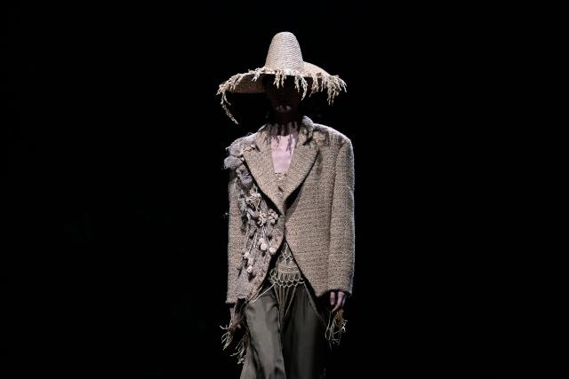 A model displays a creation from the Weilei collection by Bao Lei during the China Fashion week in Beijing on September 8, 2026. (Photo by WANG Zhao / AFP)