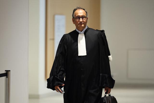 French lawyer Emmanuel Daoud arrives for the trial of the 14 alleged smugglers over the deaths of 31 migrants in the English Channel in 2021 at the Judicial court in Paris, on September 8, 2026. (Photo by SIMON WOHLFAHRT / AFP)