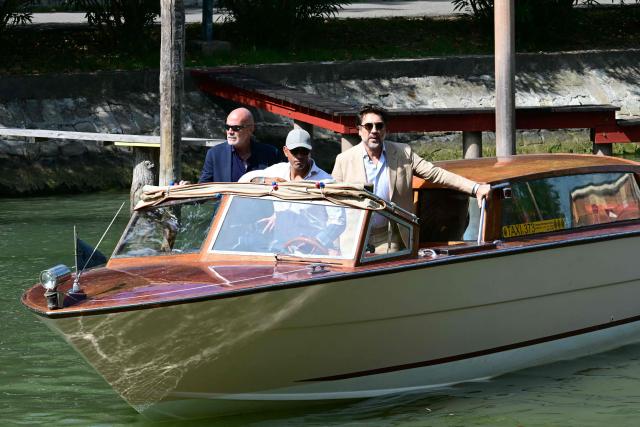 Actor Javier Bardem arrives on a taxi-boat for the photocall of "Bunker" presented in competition at the 83rd International Venice Film Festival, at Venice Lido on September 8, 2026. (Photo by Stefano Rellandini / AFP)