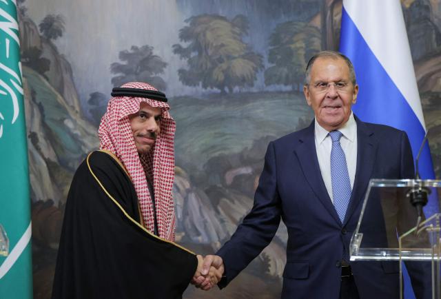 Russian Foreign Minister Sergey Lavrov (R) shakes hands with Saudi Arabia Foreign Minister Faisal bin Farhan Al Saud during a joint press-conference in Moscow on September 8, 2026. (Photo by MAXIM SHIPENKOV / POOL / AFP)