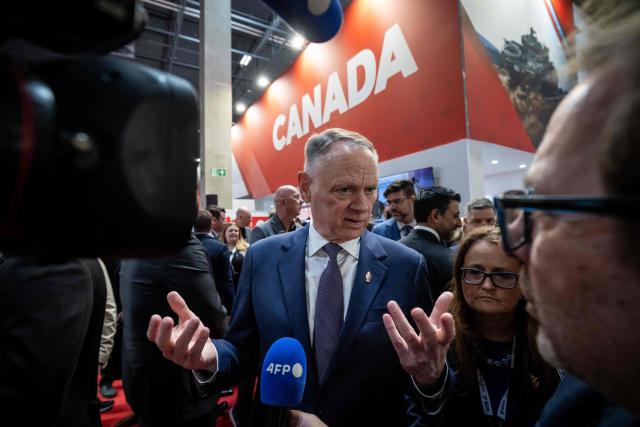 Canada’s Defence Minister David McGuinty speaks to the journalist during AFP interview on the first day of the 34th International Defence Industry Exhibition in Kielce, Poland, on 8 September 2026. The 34th International Defence Industry Exhibition runs from September 8 to 11, 2026 in Kielce, Poland. (Photo by Wojtek RADWANSKI / AFP)