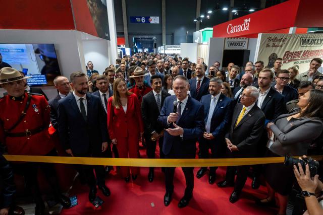 Canada’s Defence Minister David McGuinty delivers his speech during the official opening of the Canada pavilion on the first day of the 34th International Defence Industry Exhibition in Kielce, Poland, on 8 September 2026. The 34th International Defence Industry Exhibition runs from September 8 to 11, 2026 in Kielce, Poland. (Photo by Wojtek RADWANSKI / AFP)