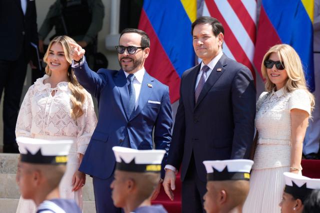 US Secretary of State Marco Rubio (2nd R) and his wife Jeanette Dousdebes are welcomed by  by Colombia's President Abelardo de la Espriella nad his wife Ana Lucia Pineda upon their arrival in Barranquilla, Colombia on September 8, 2026. (Photo by Fernando Vergara / POOL / AFP)